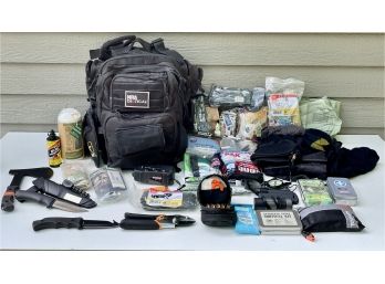 NRA Tactical Pack Filled With Survival Supplies Including 3 Knives, Radio, First Aid, Rations, & More