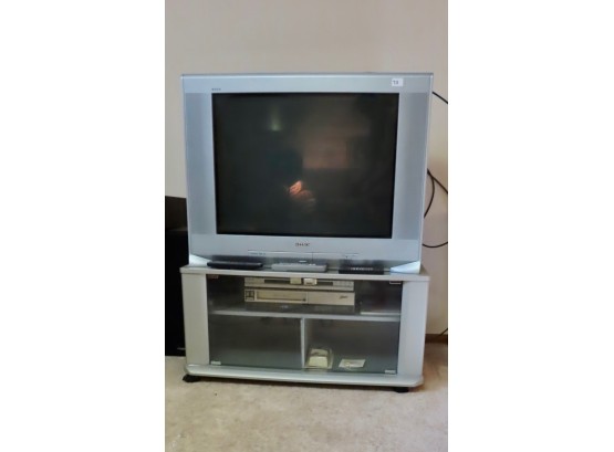 Sony Trinitron Television, Zenith VHS Player, & TV Stand