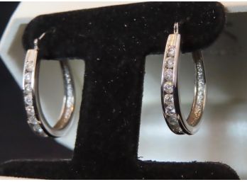 1 Carat Total Weight Channel Set Diamonds In White Gold Earrings