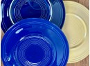 What Appear To Be 7 Fiesta Dinner Plates