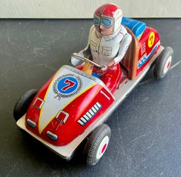 56. TIN RACE CAR W/DRIVER #7 FRICTION TOY WORKS- WE CAN SHIP!