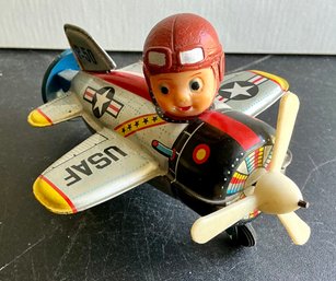 VINTAGE BANDAI JAPAN USAF P-50 FIGHTER PILOT TIN PLANE WIND UP TOY KEY- WORKS!!-WE CAN SHIP!