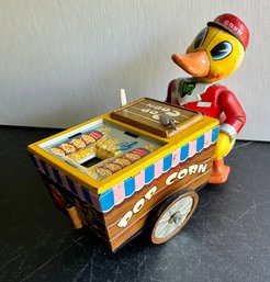 TN NOMURA BATTERY OPERATED POP CORN VENDER DUCKS TIN TOY JAPAN- WE CAN SHIP!