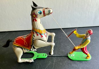 ROSKO KURAMOCHI TIN LITHO KEY WIND TOY HORSE TRAINER WORKS- 4 7/8'H X 7.5'W -WE CAN SHIP!