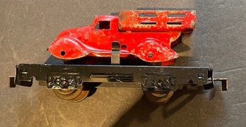 MARX TIN LITHO BLACK FLAT CAR WITH RED TRUCK - WE CAN SHIP!