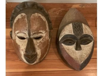 2 POLYCHROMED TRIBAL MASKS