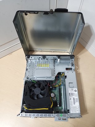 An HP Brand Desktop Computer. No Hard Drive Included. Looks Never Used (no Dust In Case).