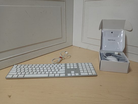 An Apple Brand Keyboard And Mouse.
