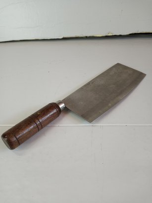 A Joyce Chen Stainless Steel Cleaver. 13' Total, About 8' Blade.