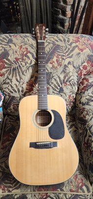 Aria 9030 Accoustic Guitar.   Holds Tune.    Nice Shape
