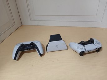 2  Wireless Controllers And A Razer Quick Charging Stand