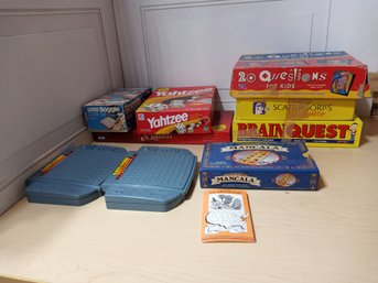 8 Used Board Games, And A Few Trivia Cards