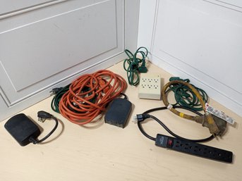 Collection Of Surge Protectors, Extension Cords And Similar Gear