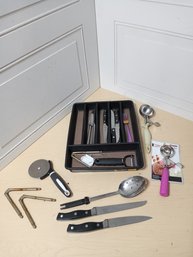 Rubbermaid Tray With An Assortment Of Utensils