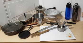 Rugged  Assortment Of Pots, Pans, Utensils And More