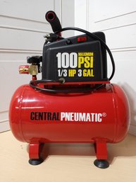 A 100 PSI 1/3 HP, 3 Gal, Central Pneumatic Air Compressor. Looks Brand New.