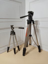 2 Telescoping Tripods. One Is From Coastar, The Other A SLIK U 9000.