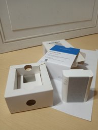 A RING Plug-in Chime For RING Devices. Opened Box, Probably Never Used.