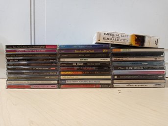 A Collection Of Over 30 CDs. Most Are Music.