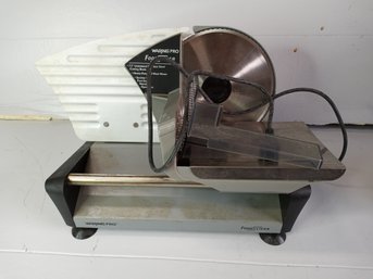 A Waring Pro FoodSlicer, 7.5' Blade, 130 Watt Motor