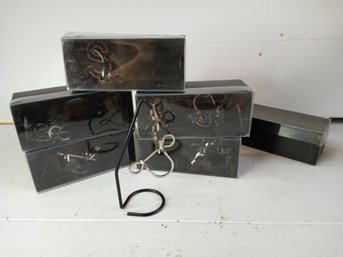 6 Matching Blacksmith Puzzles With Original Boxes And Convenient Stand.