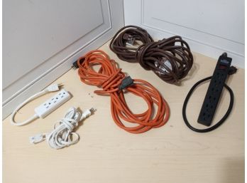 Assortment Of Extension Cords And Surge Protectors