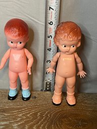 A Very Vintage Pair Of Dolls