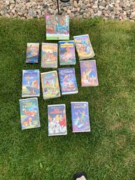 Vintage Disney VHS Tapes And A Puzzle.