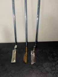 Three  Golf Putters