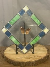 Diamond Shaped Stained Glass Bordered With Butterfly Pressed Inside