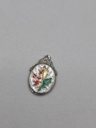 Sterling Oval Pendant With Maple Leaf  1.78g