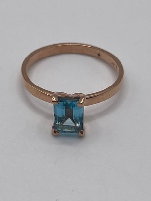 Rose Gold Colored Sterling Ring With Blue Emerald Cut Solitaire 2.73g  Size 10