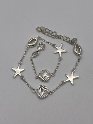 Sterling Bracelet With Starfish And Seashell Charms   5.58g    10'