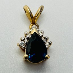 Gold Colored, Sterling, Silver Teardrop Pendant With Dark Blue Colored Stone And Unknown Markings, 1.54 G.