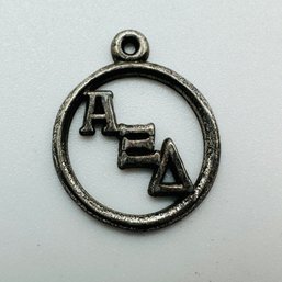 Sterling Silver Circle Pendant With Letters A & Eand Triangle Design, 0.66 G.