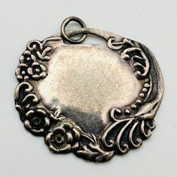 Sterling Silver Circle Pendant With Flower Design, 3.74 G.