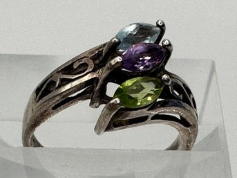 Sterling Silver Ring W/ 3 Clear Stones (green, Purple, Blue) Set In Unique Band With Unknown Markings. Size 7.