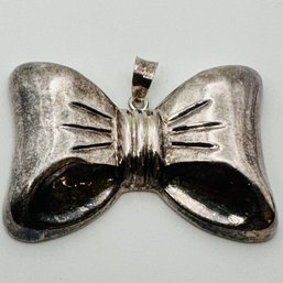 Large Sterling Silver Bow Pendant 15.41 G.