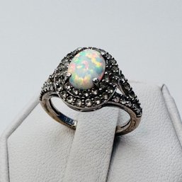 SUN -sterling Silver Engagement Style Ring With Opal Colored Stone In Clear Stone Setting Size 4.5. 2.83 G.