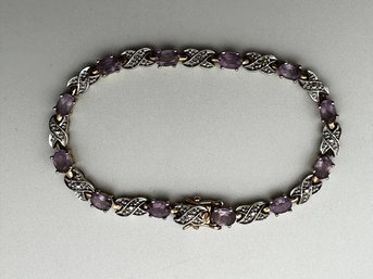 CISS Sterling Silver Colored Gold X & O Tennis Bracelet With Purple Stones 11.56g