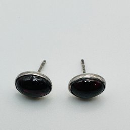 Sterling Silver Oval Stud With Red Colored Stone, 1.12 G.