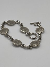 Sterling Bracelet With Detailed Discs 14.60g.  8 Long