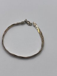 Italy -  Gold, Rose-gold And Silver Toned Braided Bracelet.     3.96g.  7 Long