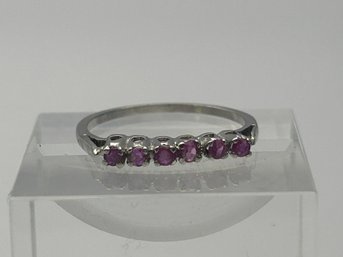 Sterling Silver Ring With Six Amethyst Colored Stones.  Size 6.  1.26g