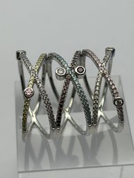 Sterling Silver Ring With Crisscross Design And Pink, Purple, Blue And Yellow Stones. Size 7.  6.33 G.