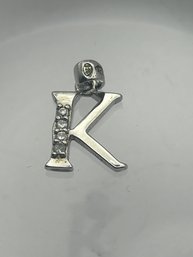 Sterling Silver K Pendant With Rhinestones. .92 G.