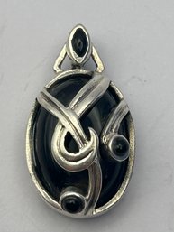 Sterling Silver Oval Pendant With Black Stone. 9.56 G