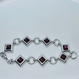 Sterling Silver Bracelet With Orange Colored Stones. 18.58g.