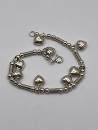 Sterling Bracelet With Heart Charms   8.80g  Sz. 7