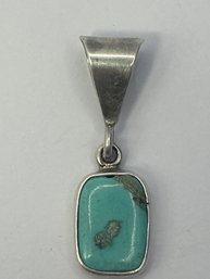 Sterling Silver Rectangular Pendant With A Blue Stone 2.82g
